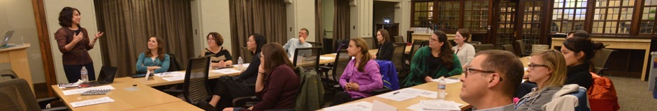 people listening to a speaker